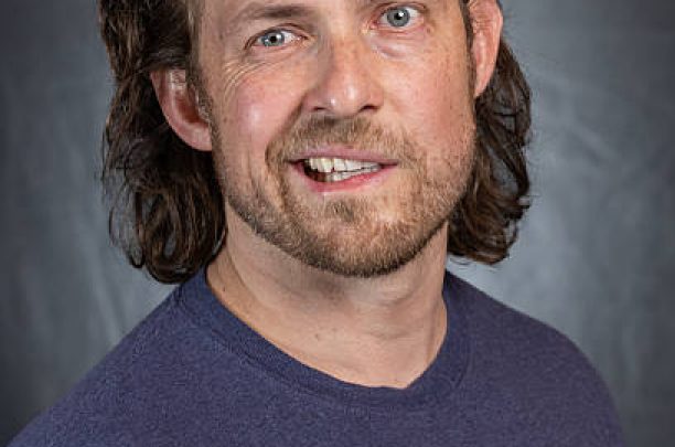 close up portrait of an adult male suffering from Bell's Palsy, a temporary facial paralysis. A common illness unknown origin.